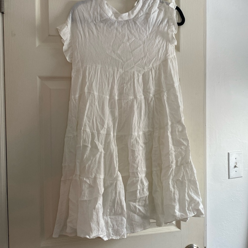 Francesca’s white swing dress